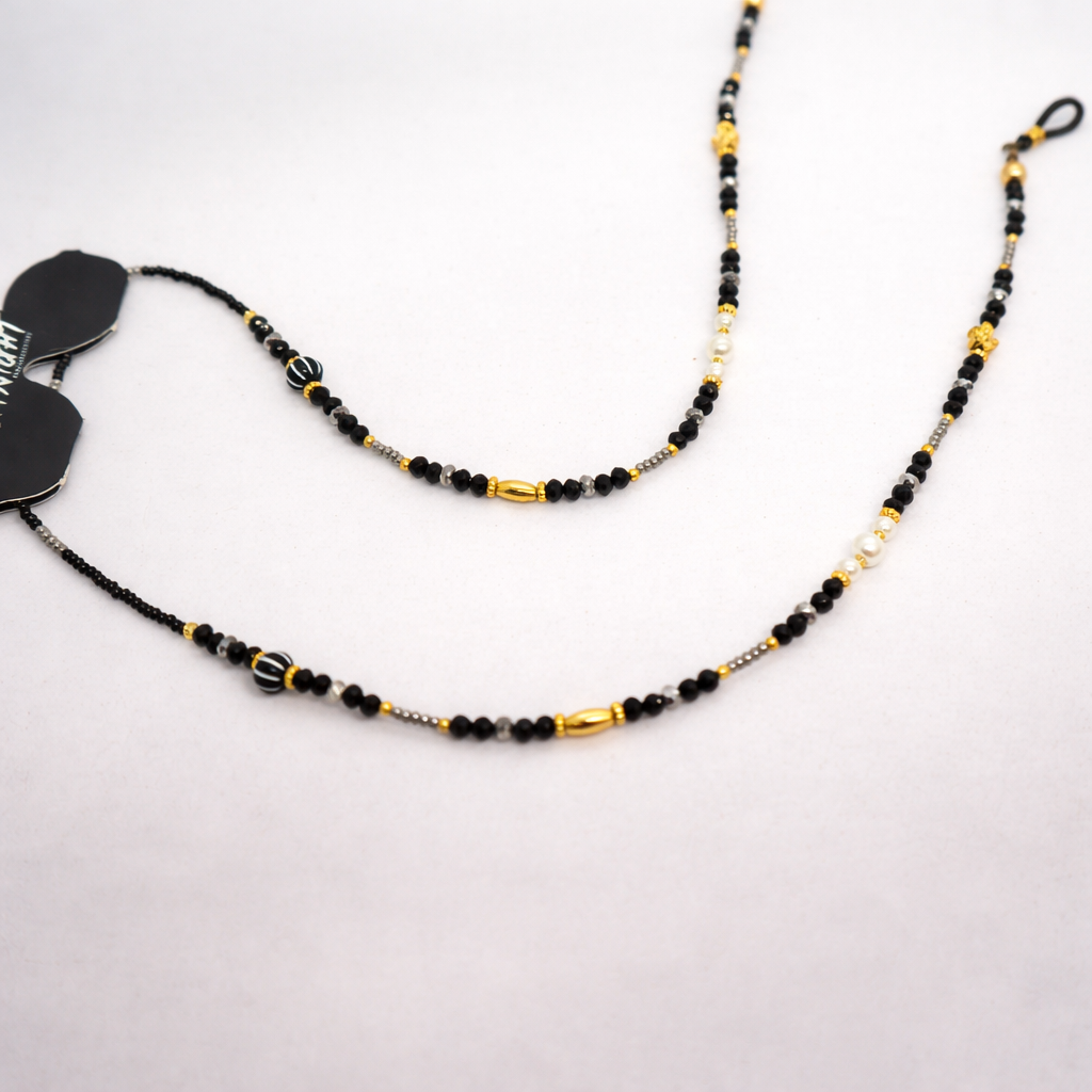 Cuelga Gafas Negro y Dorado con Perlas | At Night Sunglasses