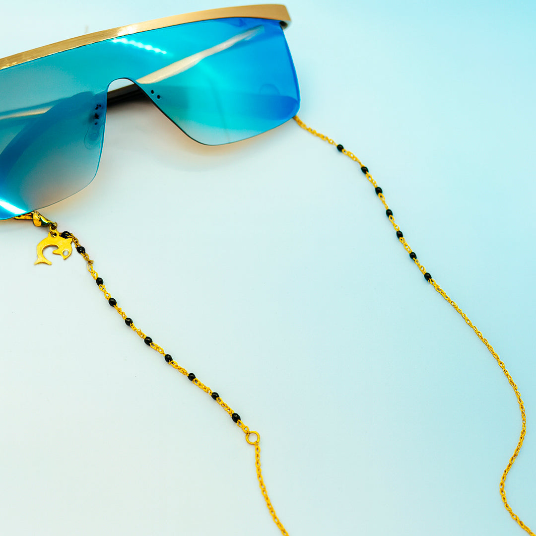 Cadena para gafas en acero dorado con dijes -- Detalle de delfín negro & dorado