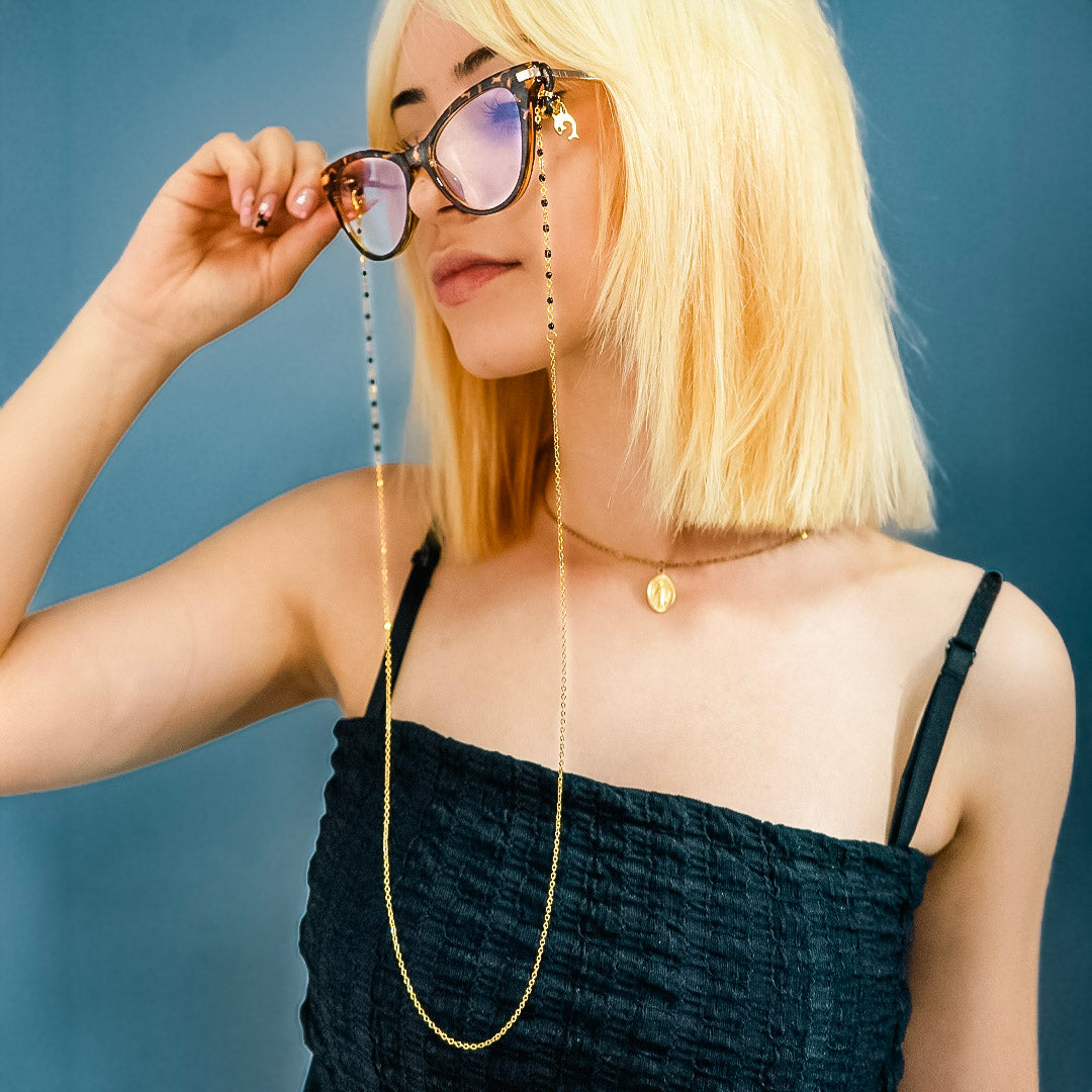 Cadena para gafas en acero dorado con dijes -- Detalle de delfín negro & dorado